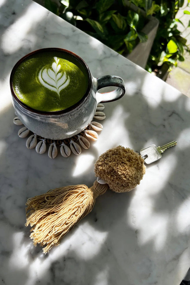 De pompon sleutelhanger - Mocca