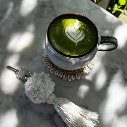 De pompon-sleutelhanger - wit