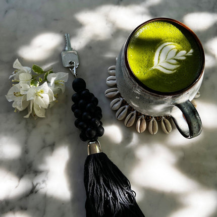 De houten kralensleutelhanger - zwart