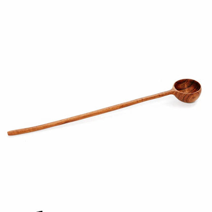 De teakwortel doseerlepel