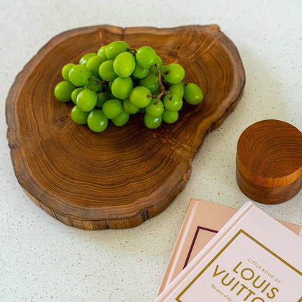 De snijplank van teakwortel